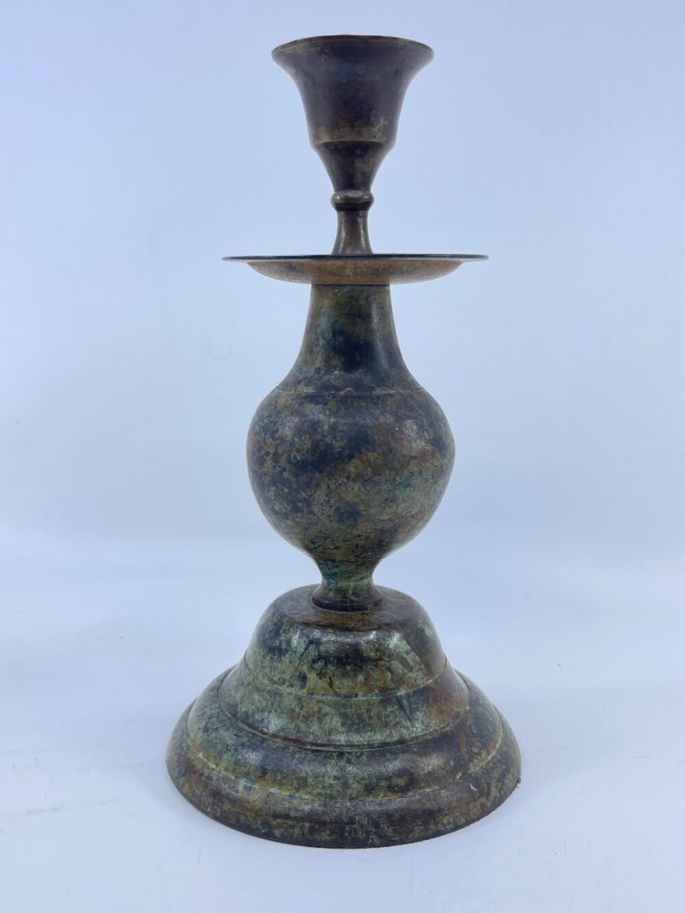 vintage patinated brass candlestick holder with tapered design rustic finish